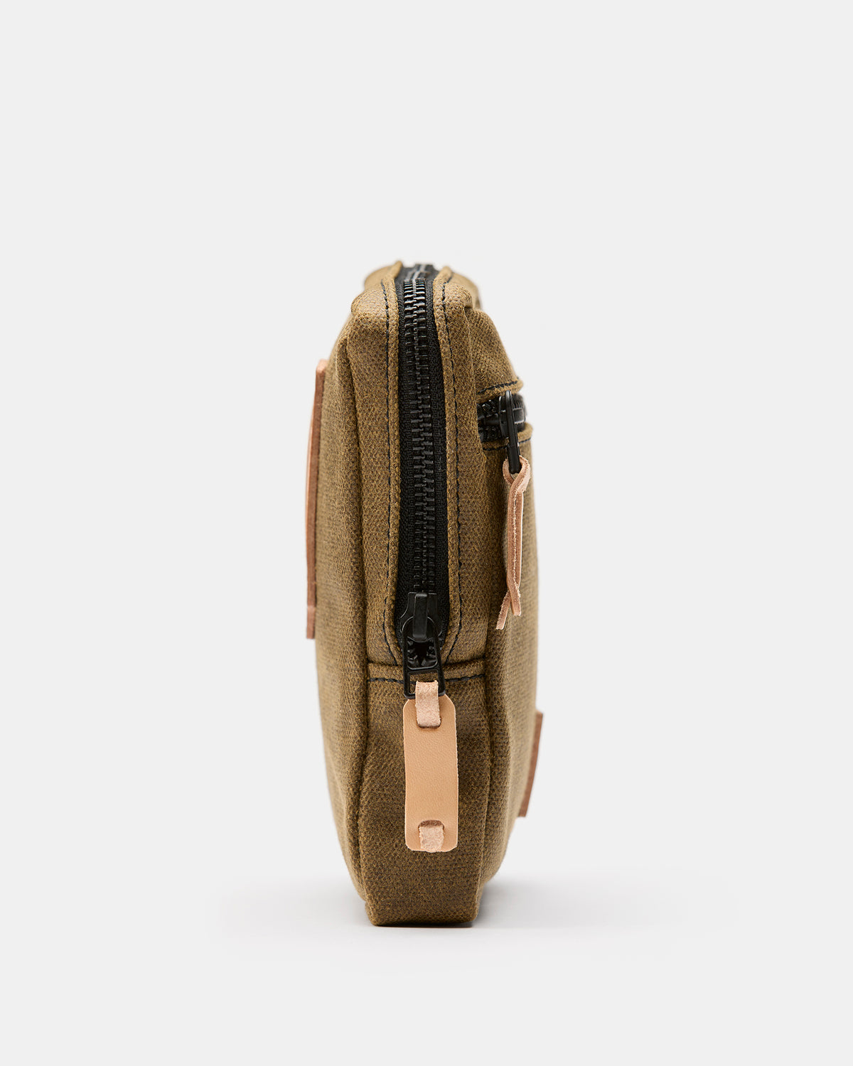 Nika waxed canvas hip pouch with vegetable-tanned Tärnsjö leather and brass zippers