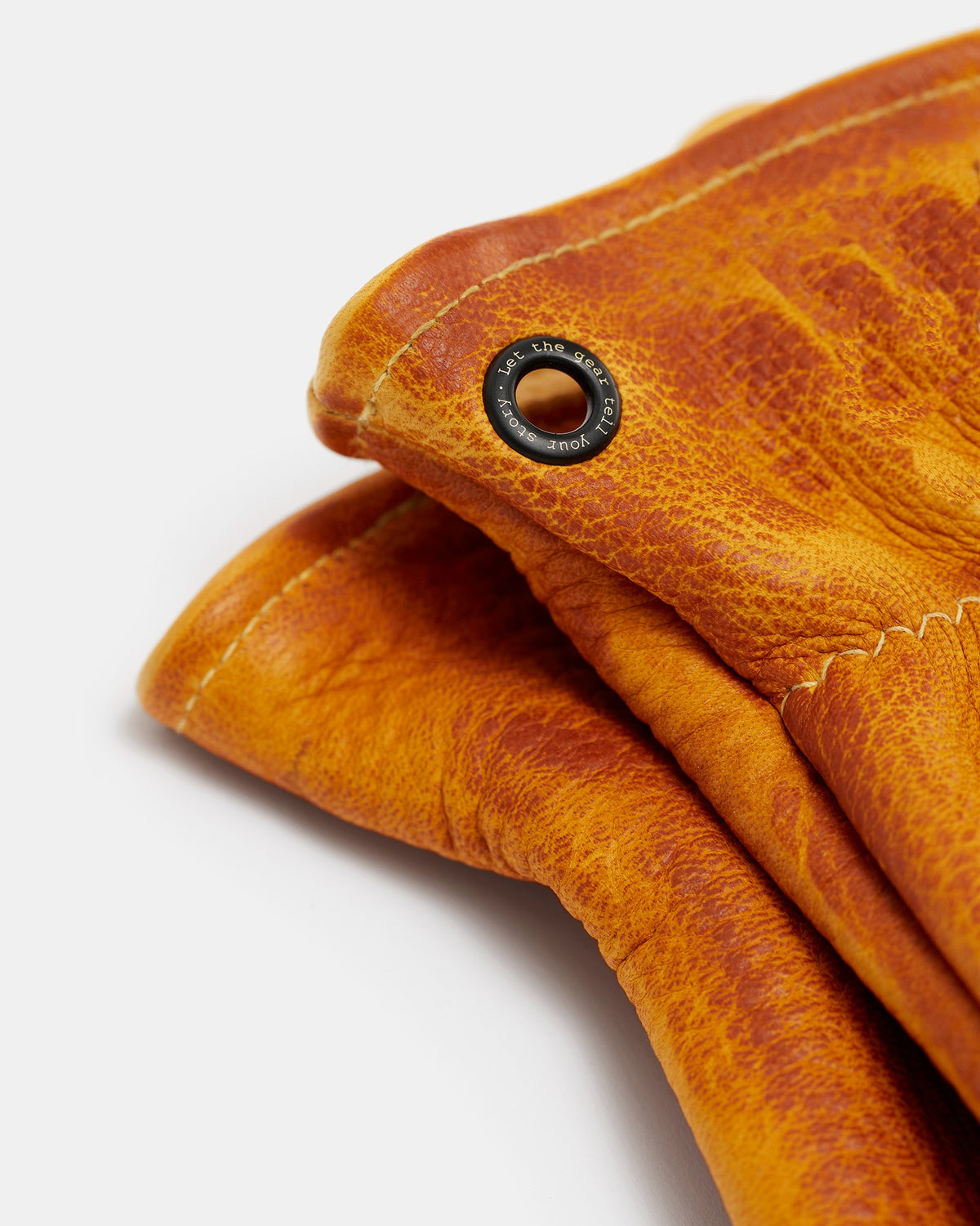 Close-up of black brass eyelet on Gjöra Elk Skin gloves