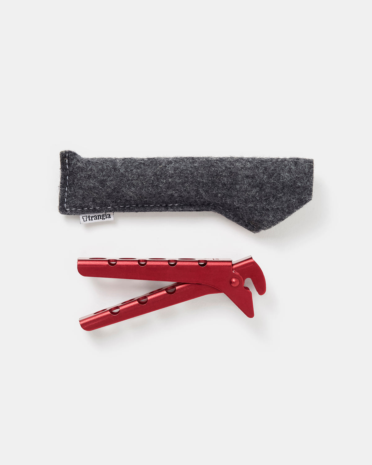 Red Trangia camping tongs with corrosion-resistant anodized finish and wool case