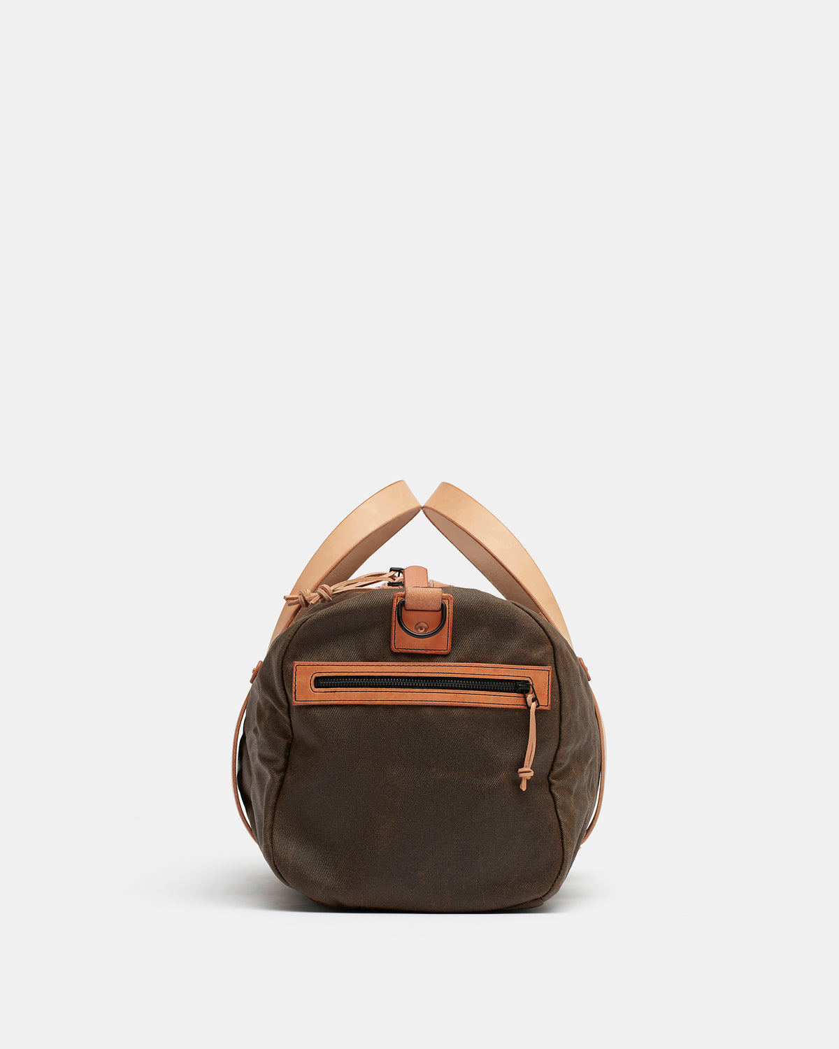 Kvåle natural waxed canvas duffel bag with exterior zippered pocket