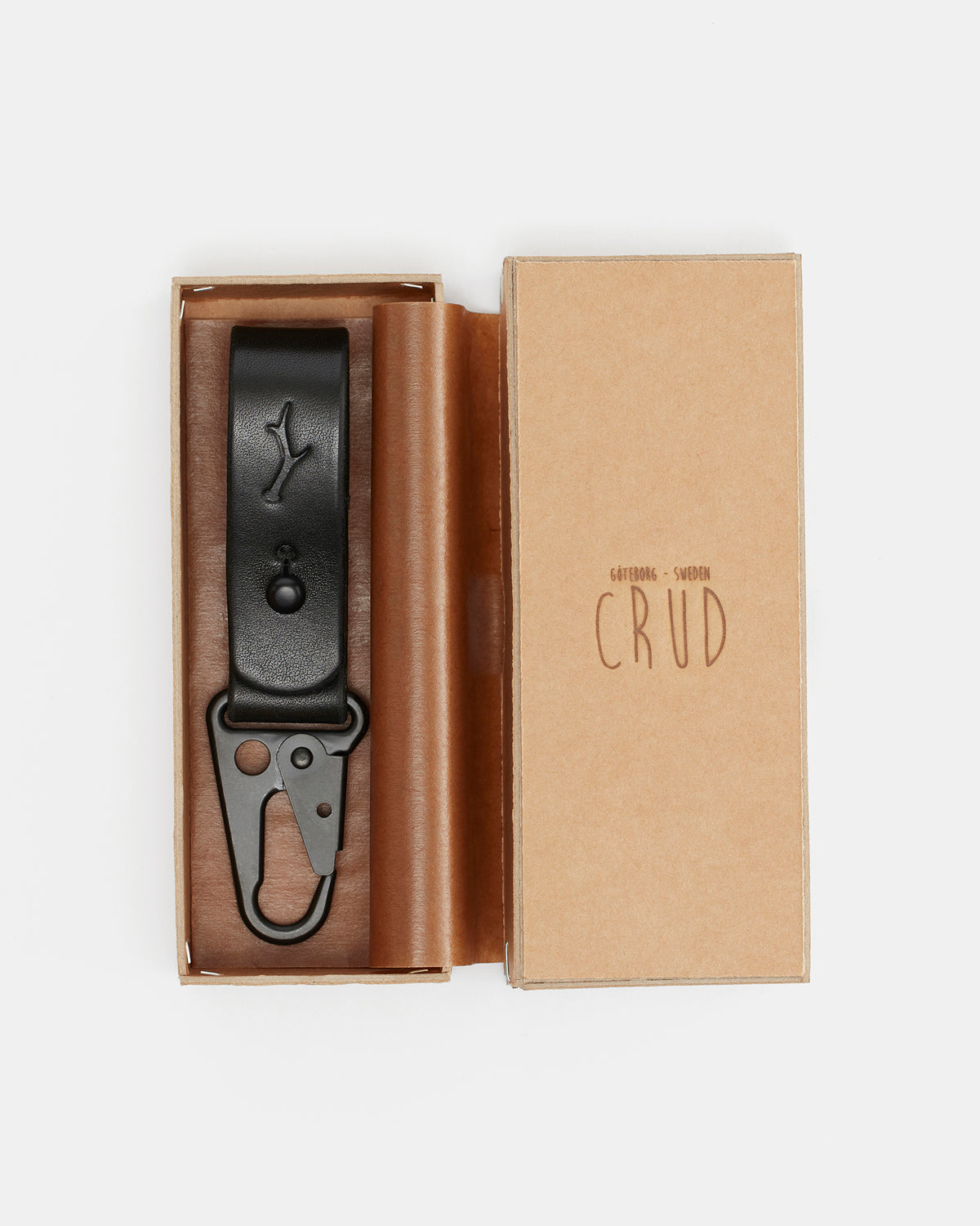 Black CRUD leather keychain designed for everyday carry