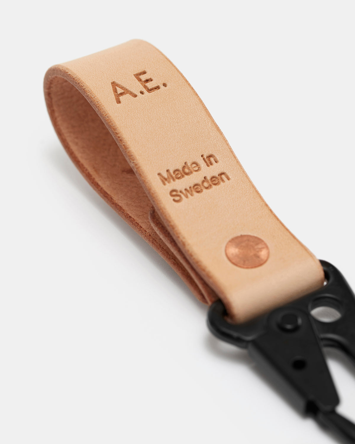 Custom leather initials hand-stamped on CRUD leather goods